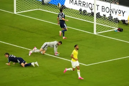 Brazil’s Matheus Cunha (right) after scoring Brazil’s third.