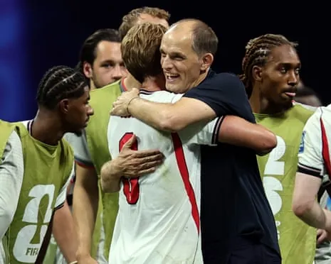 Thomas Tuchel hugs Harry Kane.