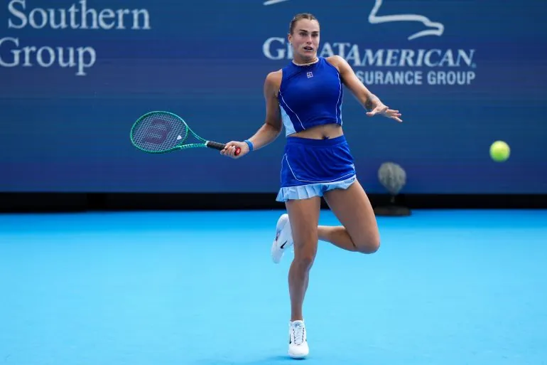 Sabalenka returns a shot against Gibson in their second-round clash